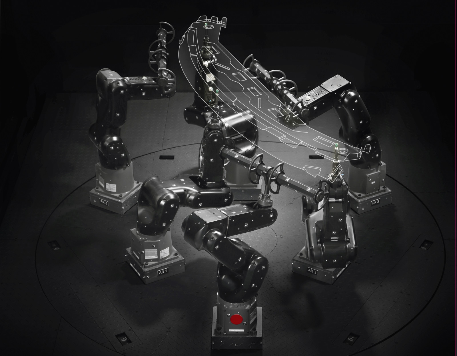 Sechs Roboter bilden die Basis der vollflexiblen, programmierbaren Bauteilaufnahme PRAFS. 